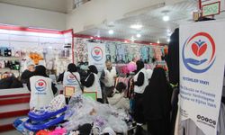 Cizre'de yetim çocuklara bot ve mont desteği