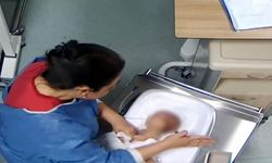 Bebeği darbeden hemşire polise teslim oldu