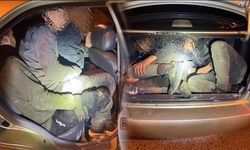 Taksi bağajında insan kaçakçılığı