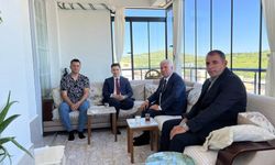 Başkan Karamehmetoğlu'ndan aile ziyareti