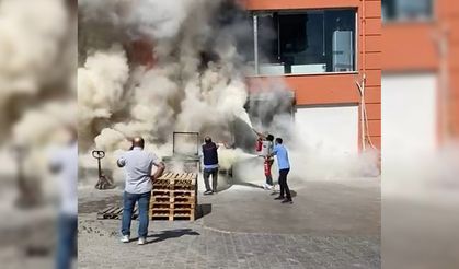 Yangın tüpünü alan koştu