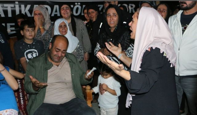 Cezaevinden tahliye olan Güran'lar, Narin’in mezarını ziyaret etti