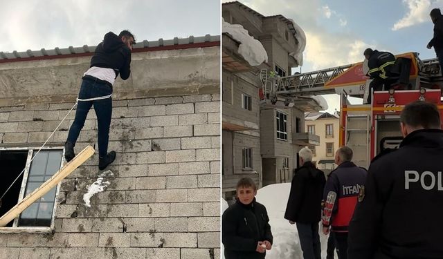 Çatıda asılı kaldı: Yardımına itfaiye yetişti