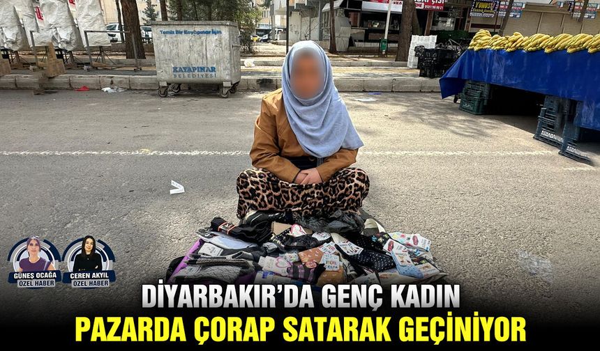 Diyarbakır’da genç kadın pazarda çorap satarak geçiniyor