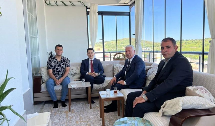 Başkan Karamehmetoğlu'ndan aile ziyareti