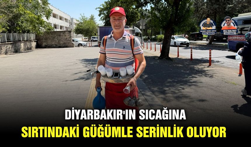 Diyarbakır'ın sıcağına sırtındaki güğümle serinlik oluyor